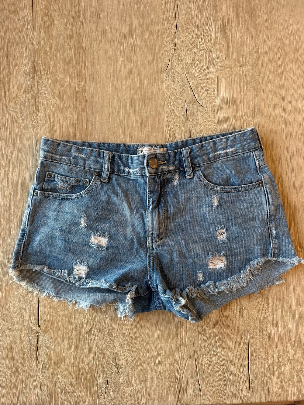 Free People Distressed Light Blue Denim Cutoff Shorts